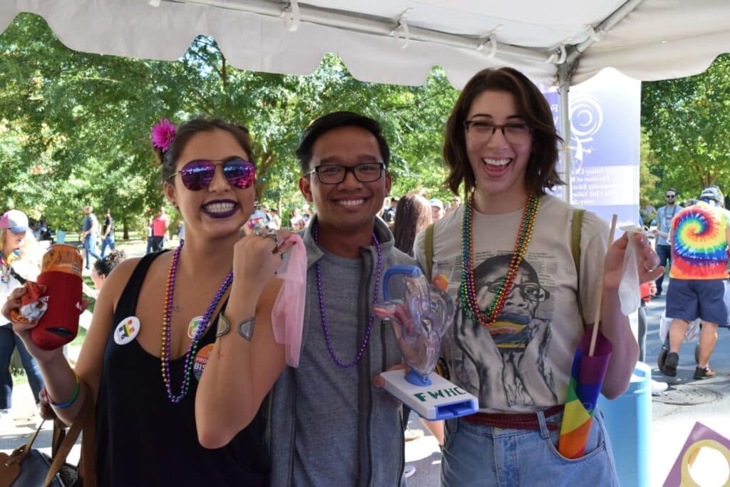 Group of attendees posing for a photo at the Atlanta Pride Event.