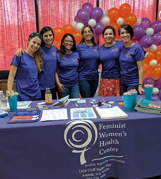 Members of the Lifting Latinx Voices Initiative team pose during the Latinx Health Fair.